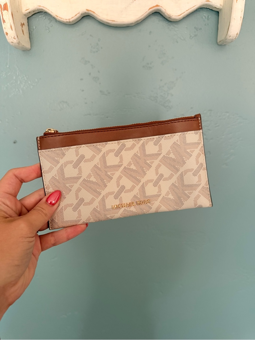 Brown and white Michael Kors Wallet